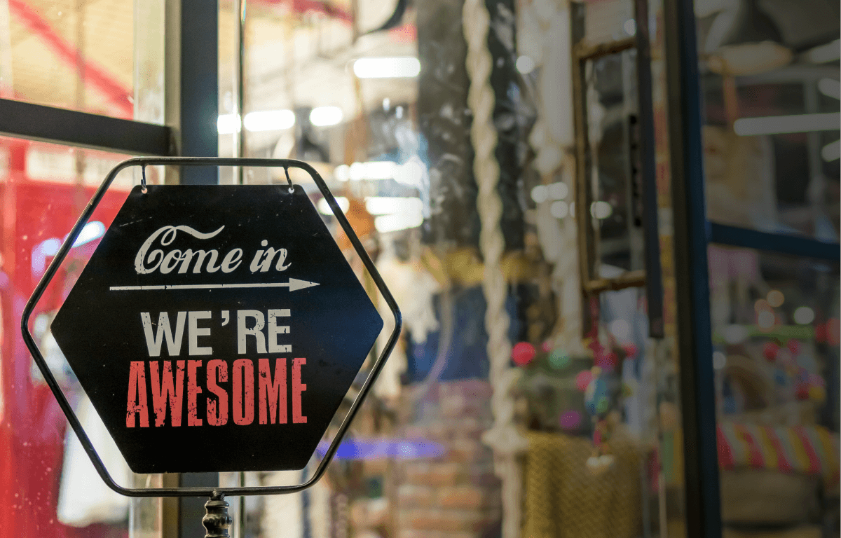 Come in we're awesome sign - crowdfunding marketing agency